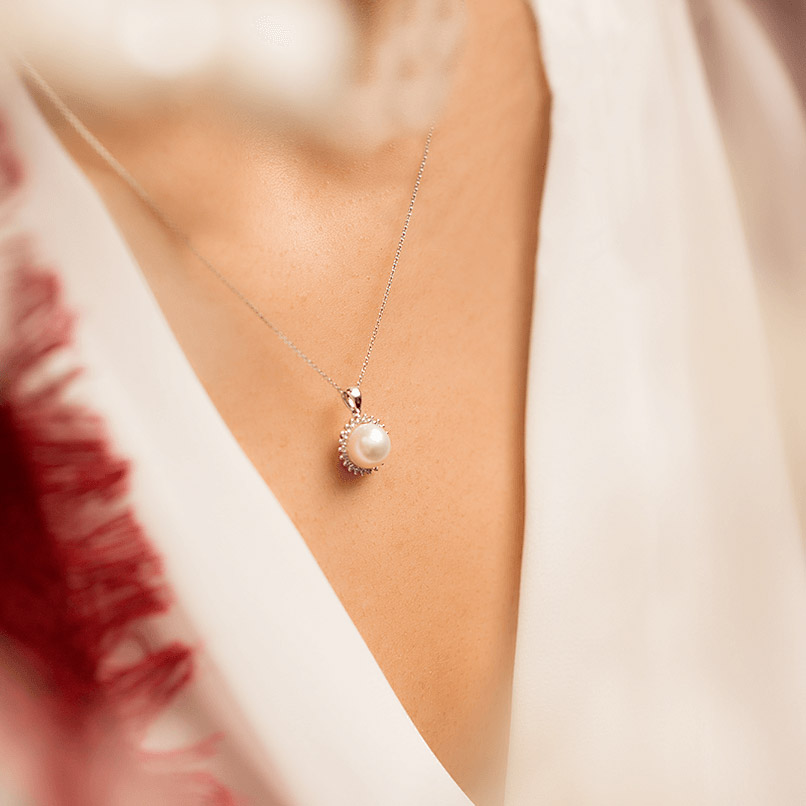 0.58 ct. Perle Diamant Halskette