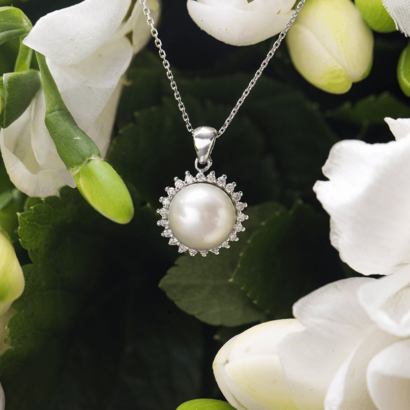 0.58 ct. Perle Diamant Halskette